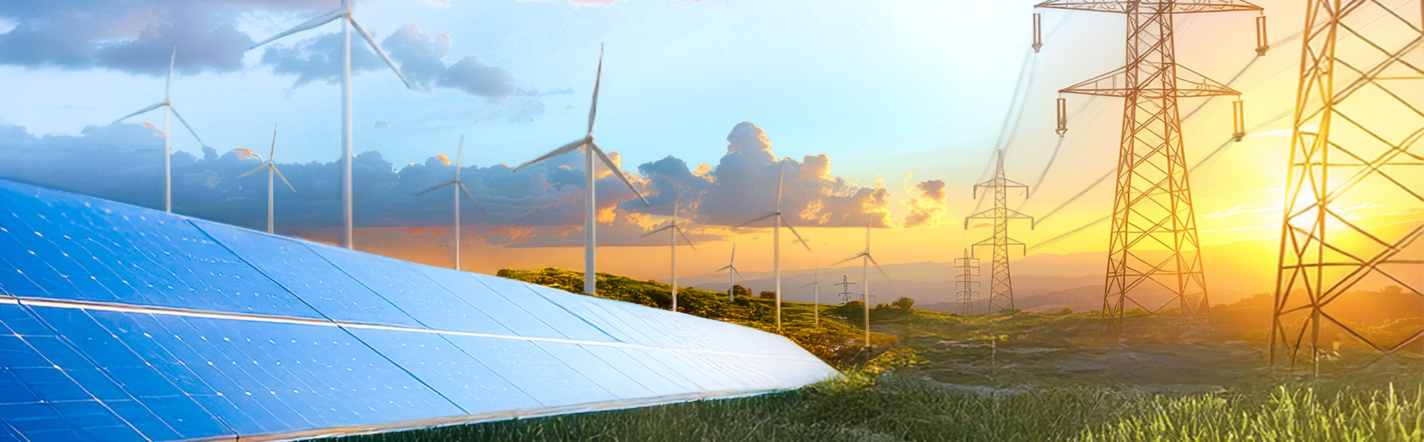 Solar panels in the front with wind turbines and power transmission towers in the background under a bright sunset sky.